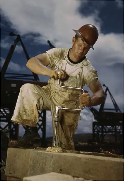 Carpenter at work on Douglas Dam, Tennessee (TVA), 1942. Creator: Alfred T Palmer