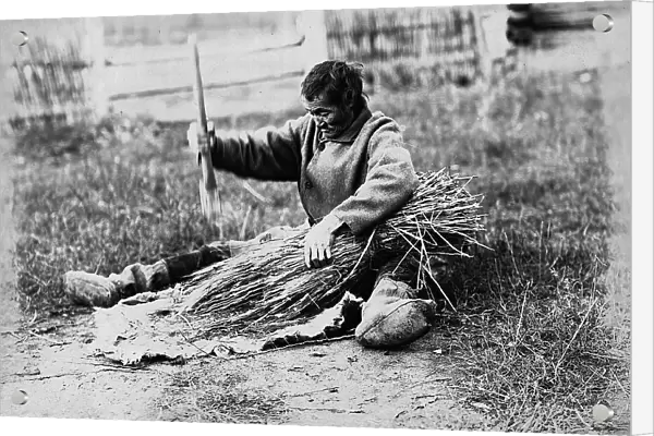 Hammering the sheaf, 1890. Creator: Unknown