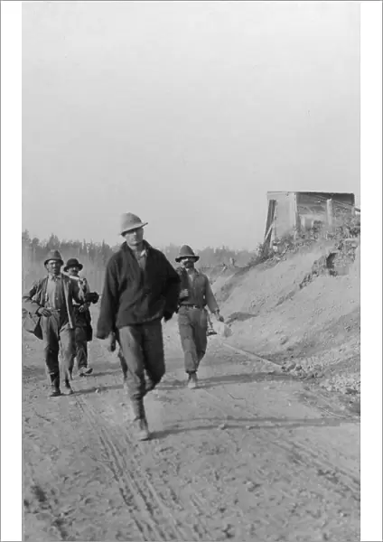 Men walking on dirt road, between c1900 and 1916. Creator: Unknown