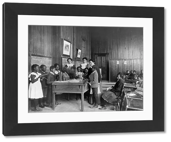 Thanksgiving Day lesson at Whittier, 1899 or 1900. Creator: Frances Benjamin Johnston