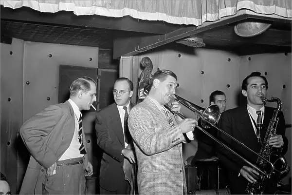 Portrait of Jack Teagarden, Bill Harris, Dave Tough, and Charlie Ventura, Three Deuces, N.Y. 1946. Creator: William Paul Gottlieb