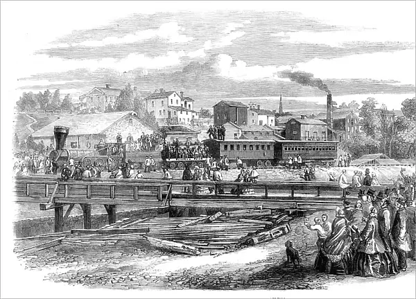 Arrival of the first train of the Atlantic and Great Western Railroad at James Town... 1860. Creator: Unknown