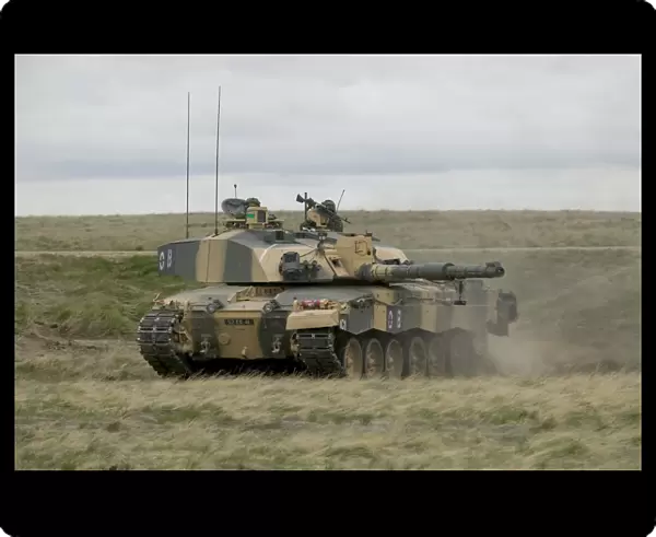 Exercise MedMan in BATUS, Canada. A Challenger Tank is shown returning to base