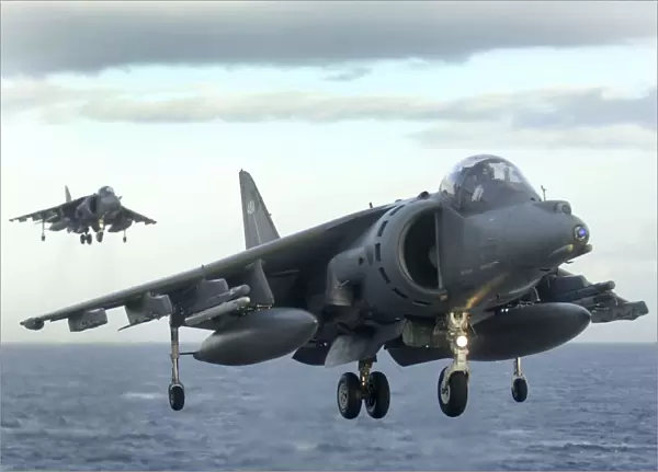 Two Harriers Landing