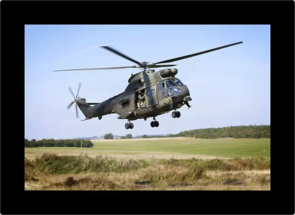 Pictured is an RAF Benson Puma 2 helicopters undertake training during EX AGILE SPEAR 15