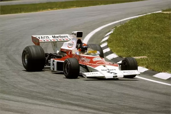 Formula One World Championship: Local favourite Emerson Fittipaldi McLaren M23 took pole position and victory of the first GP to be shortened