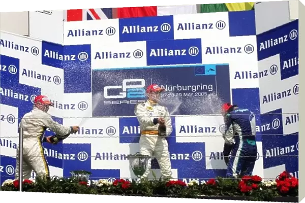GP2. The podium (L to R): Adam Carroll (GBR) Supernova, second; Adam Carroll 