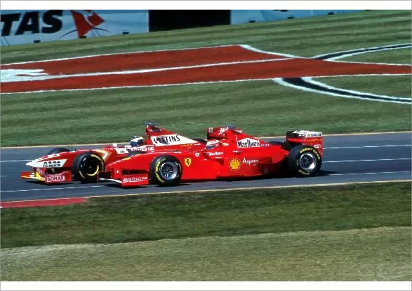 Formula One World Championship: Heinz-Harald Frentzen Williams Mecachrome FW20 overtakes Eddie Irvine Ferrari F300