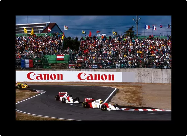 Formula One World Championship: Race winner Ayrton Senna McLaren MP4  /  8 leads his team mate and third place finisher Mika Hakkinen through the chicane