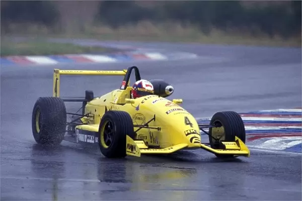 British Formula Three Championship: Race winner Juan Pablo Montoya Dallara HKS Mitsubishi F396 splashes his way through the chicane