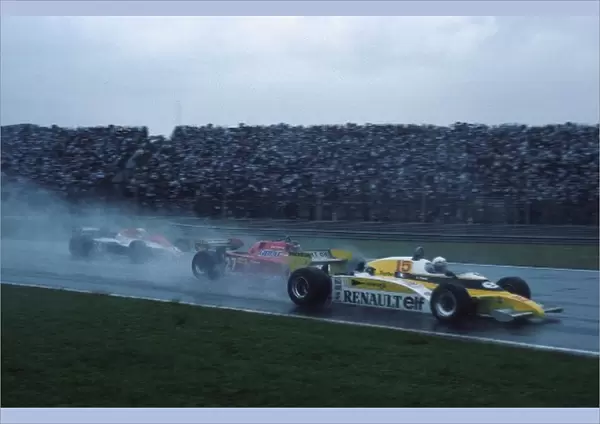 Formula One World Championship: Rene Arnoux Renault RE20B retired on the first lap after an accident, here being hit by Villeneuve with Marc