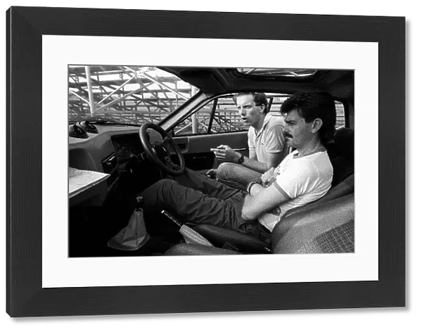 Formula One World Championship: Brabham designer Gordon Murray shows the inside of his Midas kit car to journalist Russell Bulgin