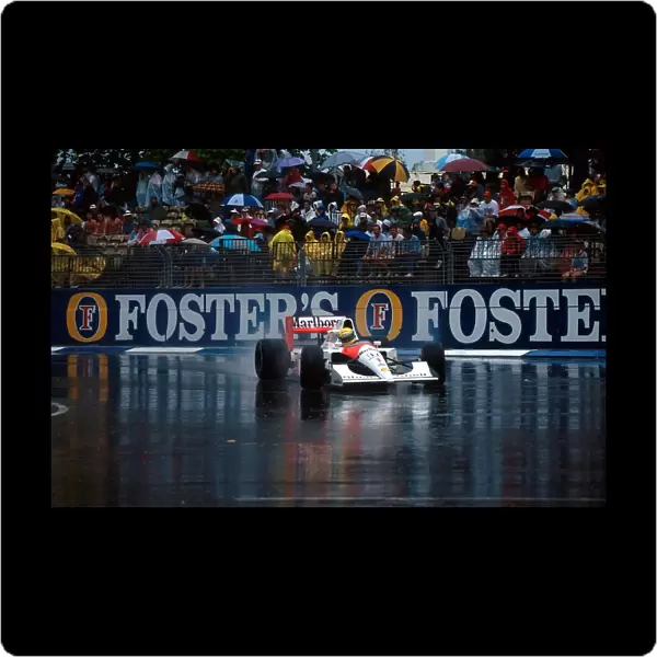 Formula One World Championship: Race winner Ayrton Senna McLaren MP4  /  6 leads in the appalling conditions that stopped the race after 14 of the