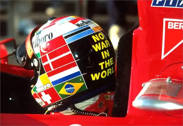 Formula One World Championship: Fifth place finisher Gerhard Berger Ferrari 412 T2 sported a different helmet design ├É the result of a competition