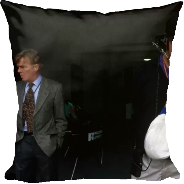 Formula One World Championship: Max Mosley, FIA President and former part-owner of Simtek Research, waits in the Simtek garage as Nick Wirth