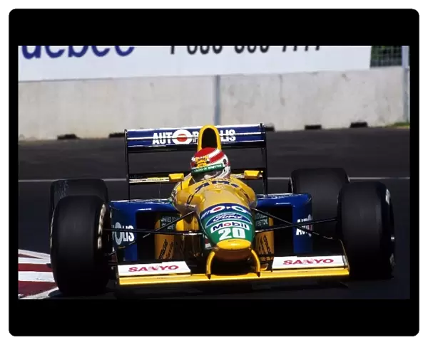 Formula One World Championship: Nelson Piquet Benetton B191 inherited victory two-thirds of the way around the final lap of the race