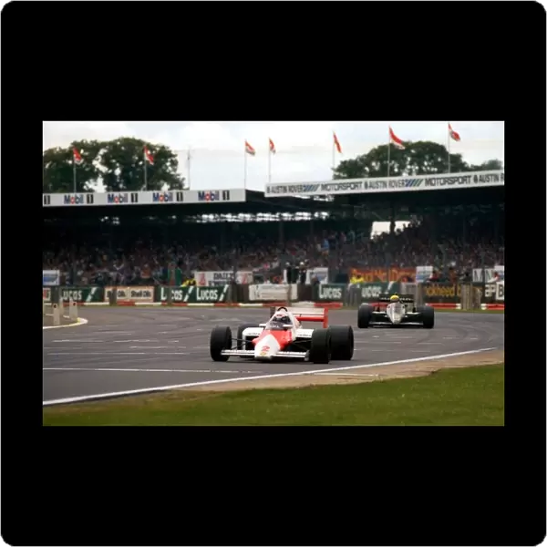 Formula One World Championship: Race winner Alain Prost McLaren MP4  /  2B leads Ayrton Senna Lotus 95T
