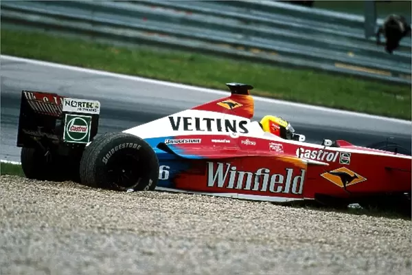 Formula One World Championship: Ralf Schumacher Williams FW21 spins off into retirement attempting to overtake Pedro Diniz Sauber