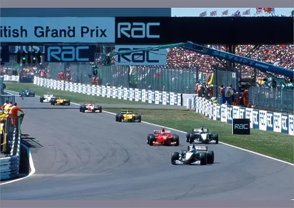 Formula One World Championship: Mika Hakkinen leads on lap 2 after the re-start