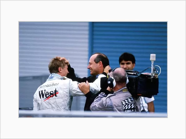 Formula One World Championship: Ron Dennis Mclaren Boss congratulates Mika Hakkinen on his victory