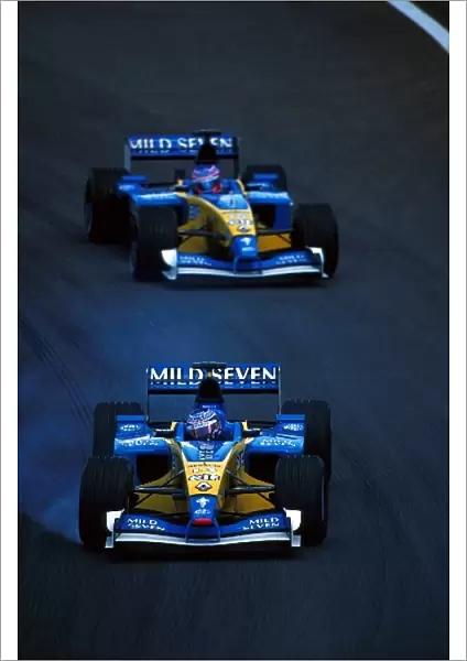 Formula One World Championship: Jarno Trulli Renault R202 leads team mate Jenson Button Renault R202