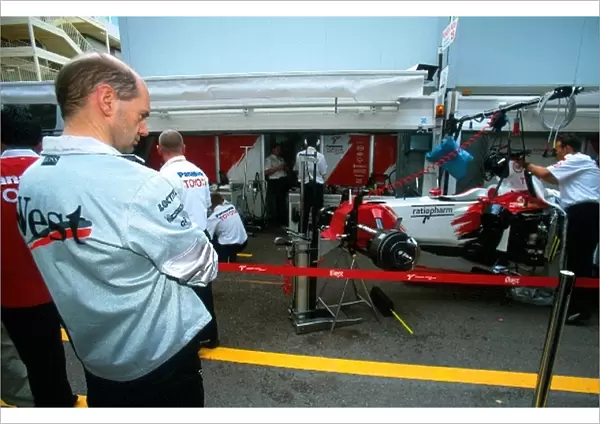 Formula One World Championship: Adrian Newey McLaren Technical Director takes an opportunity to monitor the Toyota team