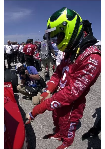 Bruno Junqueira suits up before qualifying fifth for the Miller Lite 250