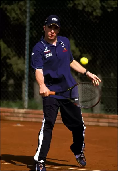 Formula One World Championship: Nick Heidfeld Sauber took time out to play tennis at the Sanchez tennis academy