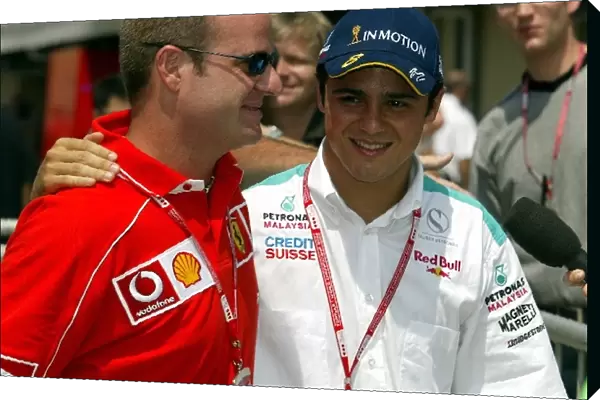 Formula One World Championship: Fellow Brazilians Rubens Barrichello of Ferrari with Felipe Massa of Sauber