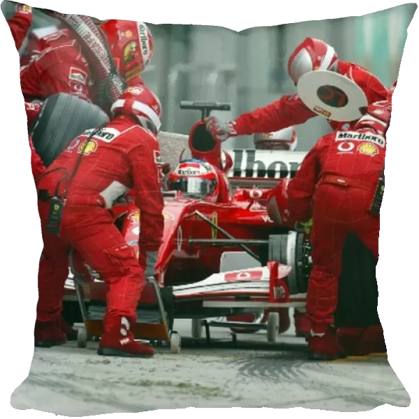 Formula One World Championship: Slick pit work for Rubens Barrichello Ferrari F2001 did not stop him from retiring out on the track