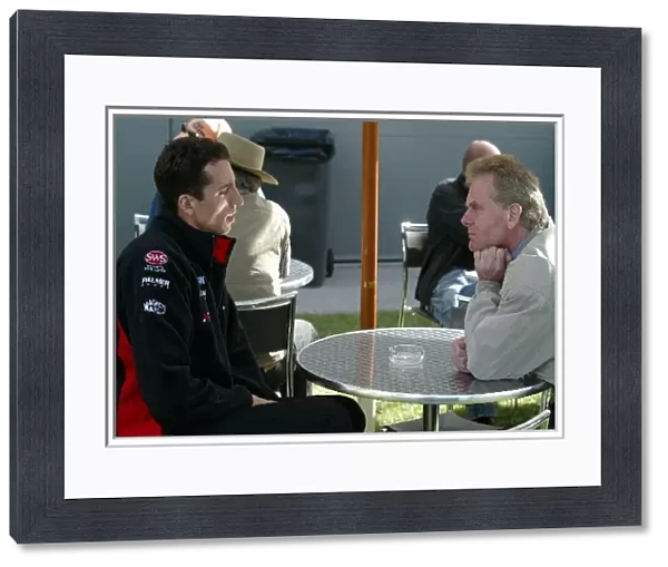 Formula One World Championship: Justin Wilson Minardi Cosworth PS03 with his manager Jonathan Palmer