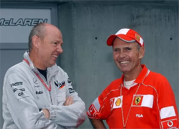 Formula One World Championship: Steve Hallam McLaren Engineer with Kenny Symanski one-off Ferrari assistant for the US GP