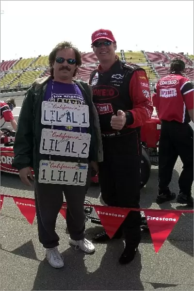 Al Unser, Jr. (USA) meets up with his number 1 fan just prior to qualifying ninth for the Yamaha 400
