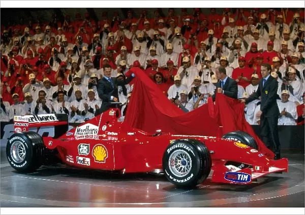 Formula One Launch: Michael Schumacher, Rubens Barrichello and Luca Badoer unveil Ferraris 2001 race car
