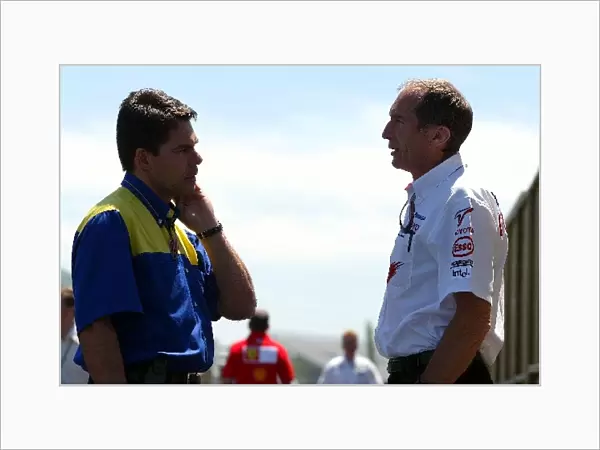 Formula One World Championship: Humphrey Corbett Toyota Race Engineer chats with a representative of Michelin