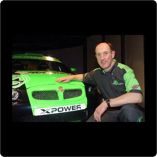 MG X Power 2002 Launch: Gwyndaf Evans poses with the Super 1600 MG ZR EX258 rally car that he will drive in the 2002 FIA Junior World Rally