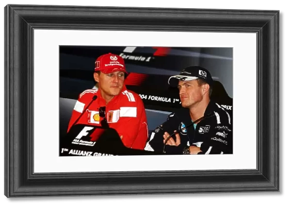 Formula One World Championship: Brothers Michael Schumacher Ferrari and Ralf Schumacher Williams in the FIA Press Conference