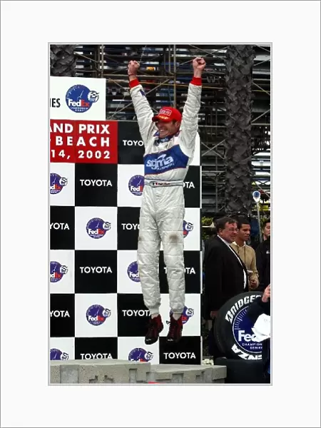 CART FedEx Championship Series: A jubilant Max Papis jumps for joy after finishing third with the underdog Sigma Team