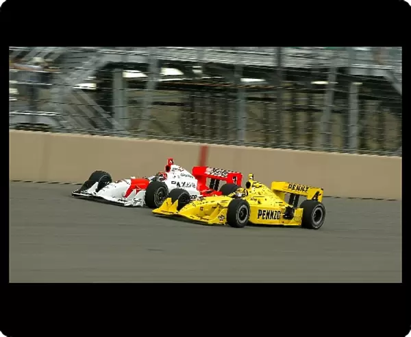 Indy Racing League: Second placed Helio Castroneves Team Penske Dallara Chevrolet is passed down the inside by third placed Sam Hornish Jr
