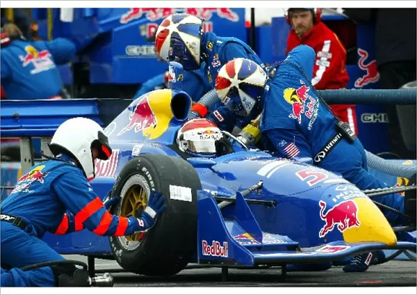 Seventh placed Eddie Cheever (USA) Red Bull Racing Dallara Infiniti makes a pit stop