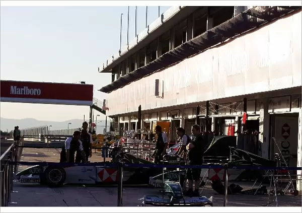 Formula One World Championship: The sun sets over Budapest and the Jaguar team in the pits