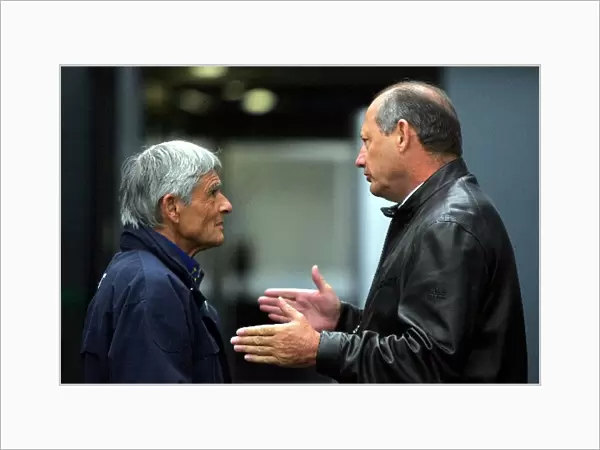 Formula One World Championship: Pierre Dupasquier Michelin Director of Worldwide Racing talks with Ron Dennis McLaren Team Principal