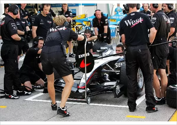 Formula One World Championship: The McLaren team practice pitstops