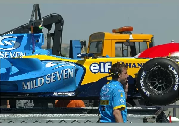 Formula One Testing: Franck Montagnys Renault R24 stopped on the circuit with engine trouble