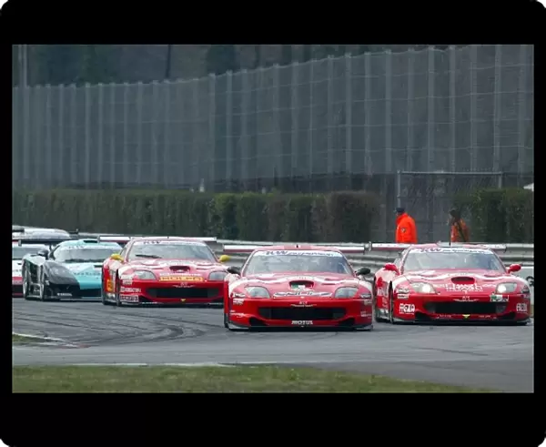FIA GT Championship: The start of the race with the two Ferraris of BMS Scuderia Italia for the lead