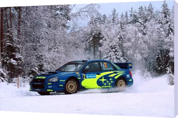 World Rally Championship: Mikko Hirvonen with co-driver Jarmo Lehtinen Subaru Impreza WRC on stage 7