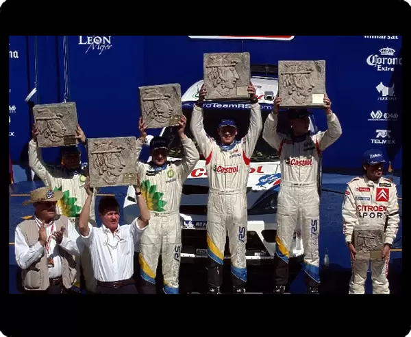 FIA World Rally Championship: Ford celebrate a 1-2 finish on the podium: Stephane Prevot Ford, Malcolm Wilson Ford Team Boss, Francois Duval Ford 2nd