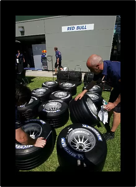 Formula One World Championship: Red Bull mechanics prepare tyres