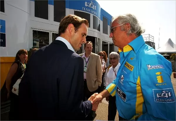 Formula One World Championship: Nicholas Clarry CVC Capital Partners talks with Flavio Briatore Renault Team Principal