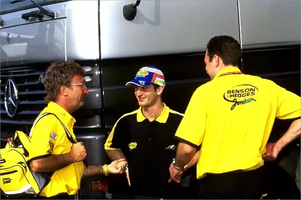 Formula One World Championship: Eddie Jordan and Jarno Trulli enjoy a joke